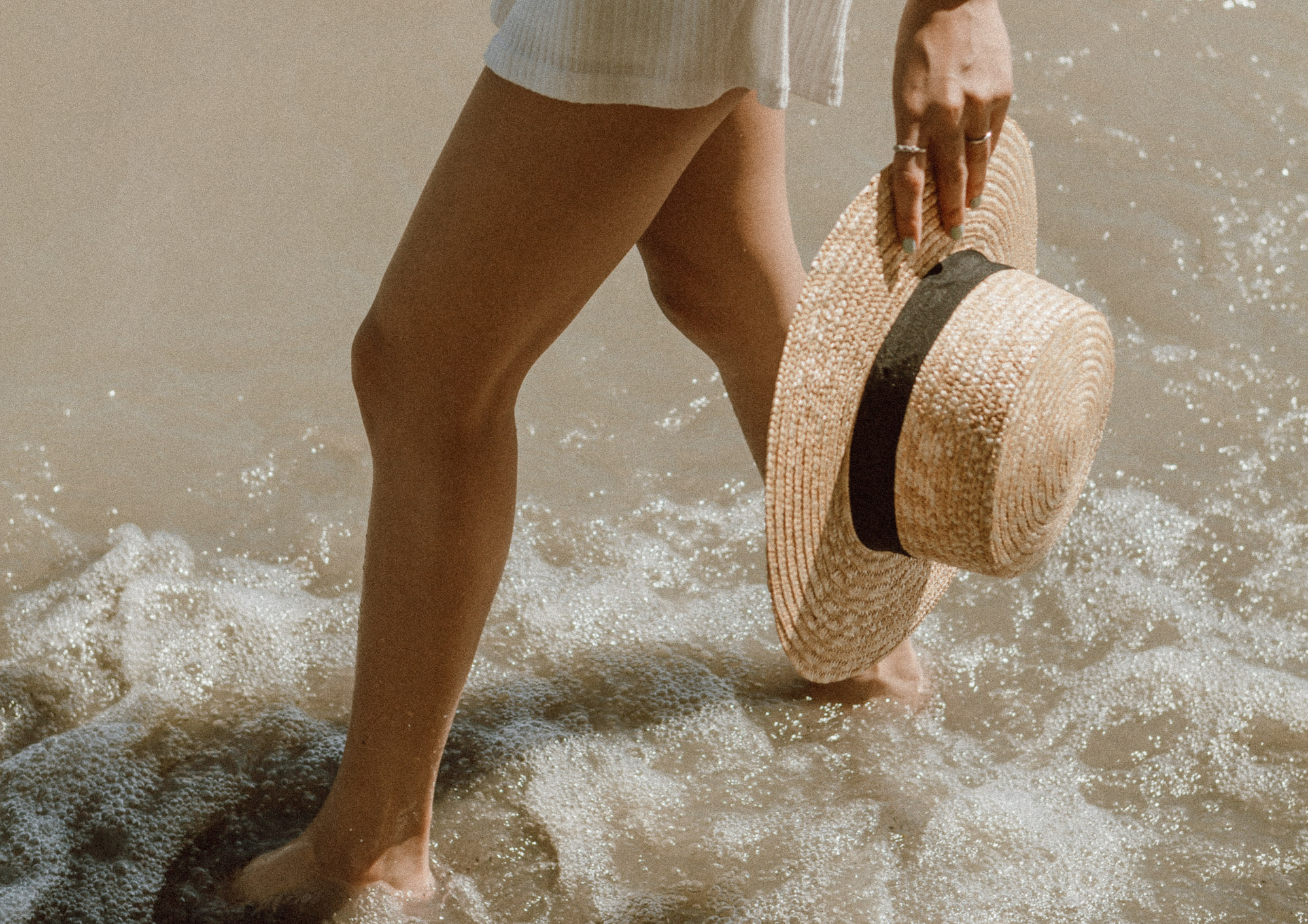 Woman walking on the beach